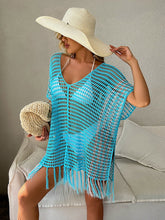 Kleid mit ausgehöhlten Quasten